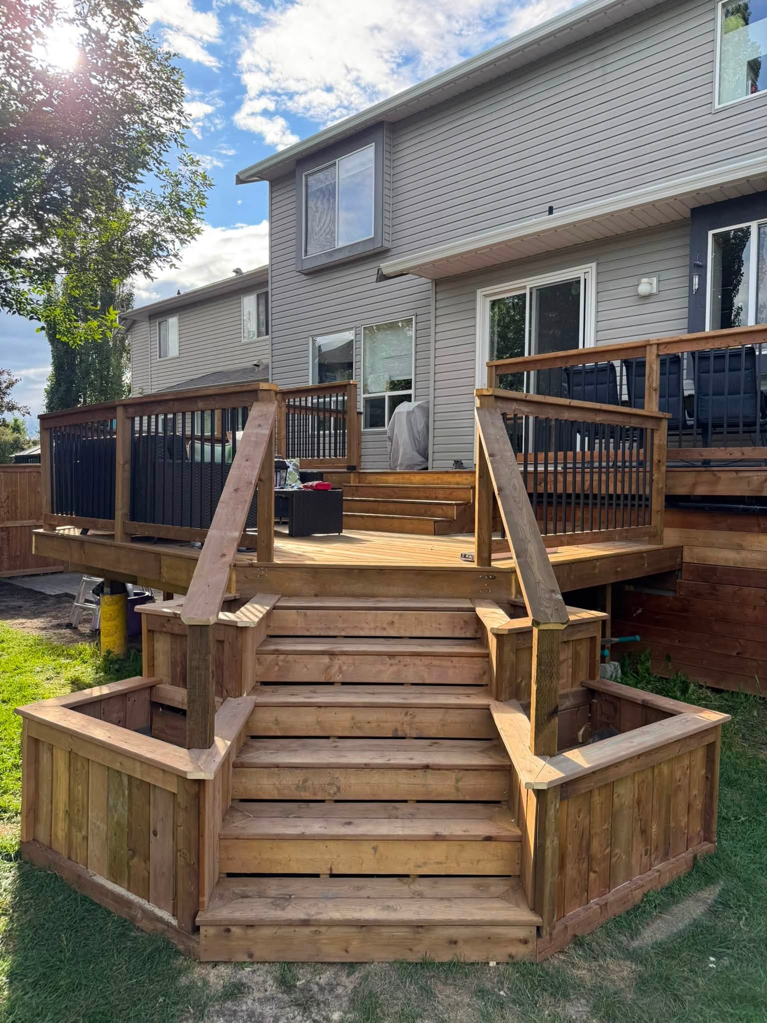Completed pressure-treated deck project in Airdrie